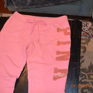 Pink sweatpants with pink sequins.